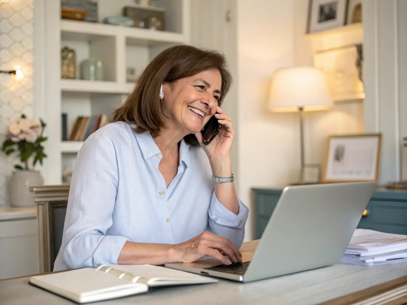 A serene image of a family member receiving a reassuring phone call about their elderly parent's well-being, symbolizing peace of mind.